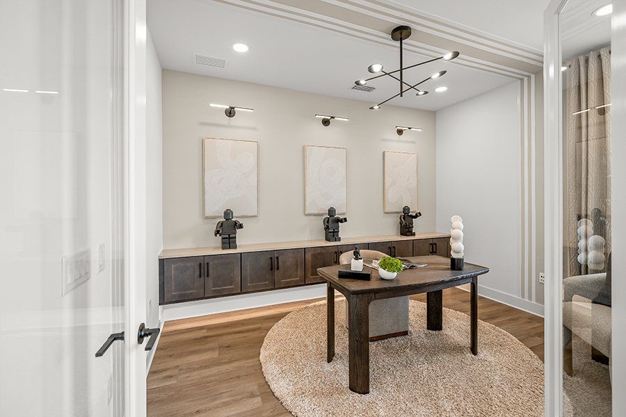 Representative furnished interior of a home built from the Regatta by Homes by Towne in Shellstone at Waterside, Sarasota (Image 11).