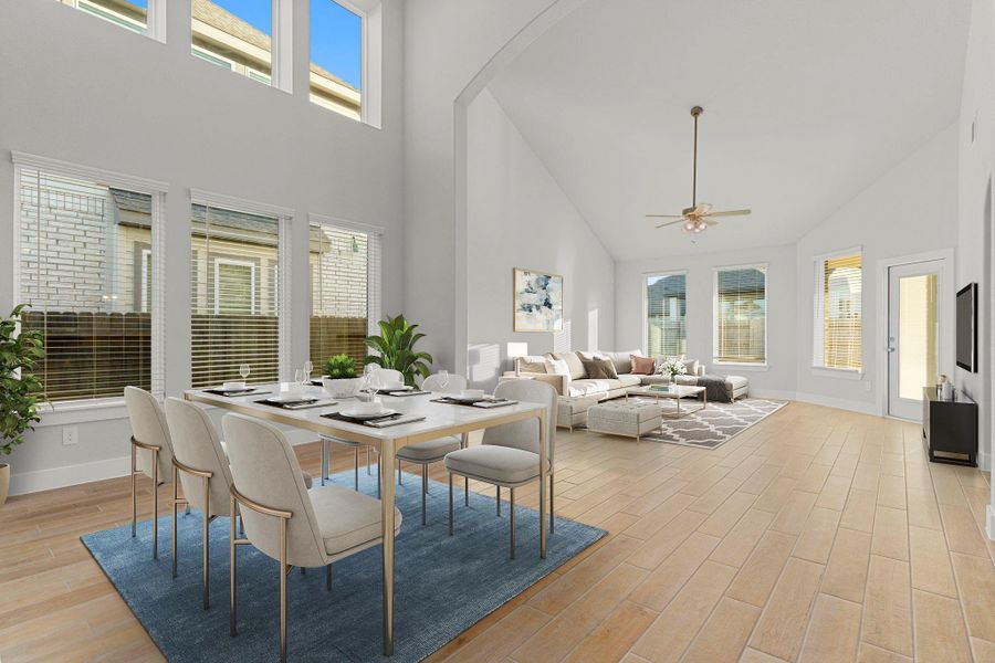 Just beyond the entry, the spacious dining area sets the stage for everyday meals and special gatherings alike. With tall ceilings, wood-like tile floors, and easy access to the kitchen, it’s perfect for family dinners or entertaining guests. *Staged Photo* Just beyond the entry, the spacious dining area sets the stage for everyday meals and special gatherings alike. With tall ceilings, wood-like tile floors, and easy access to the kitchen, it’s perfect for family dinners or entertaining guests. *Staged Photo*