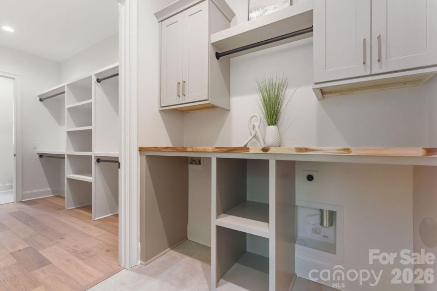 Laundry Off Primary with More Custom Cabinetry Laundry Off Primary with More Custom Cabinetry