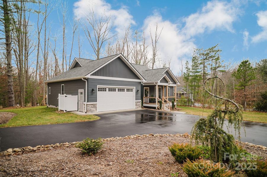 Front exterior of a new home in , Hendersonville, NC, highlighting curb appeal (Image 23). Front exterior of a new home in , Hendersonville, NC, highlighting curb appeal (Image 23).