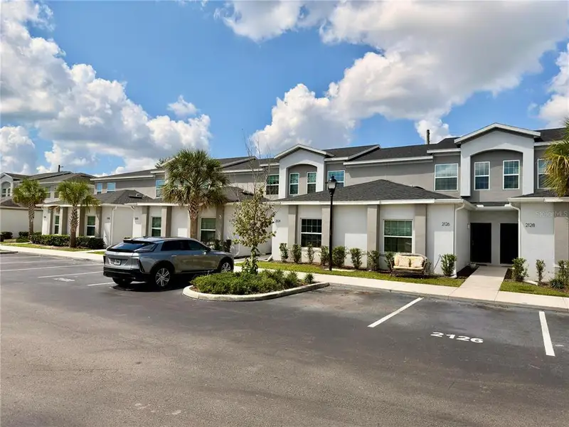 Front exterior of a new home in , Kissimmee, FL, highlighting curb appeal (Image 1). Front exterior of a new home in , Kissimmee, FL, highlighting curb appeal (Image 1).