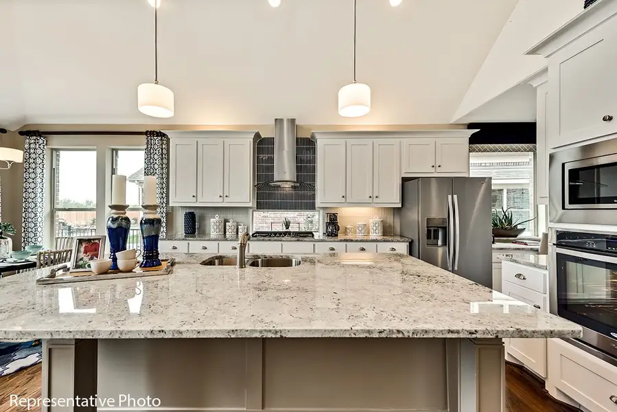 Representative furnished interior of a home built from the Alexandria II by Grand Homes in Grand Oaks, Celina (Image 8).