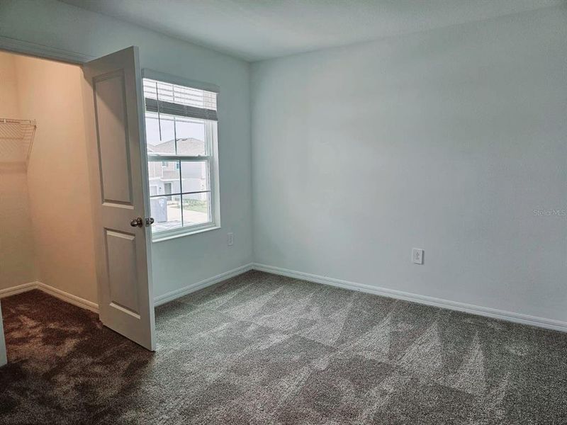 Spacious, unfurnished interior of a new home in Peace Creek Reserve, Winter Haven (Image 11).