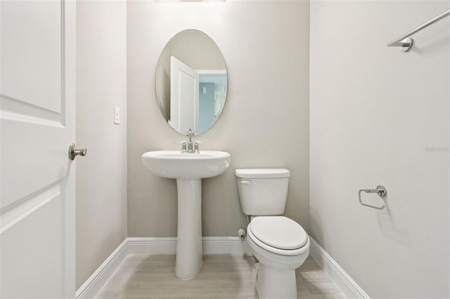 Furnished interior view inside a new home in Legends Preserve - Signature Series, Daytona Beach (Image 10).