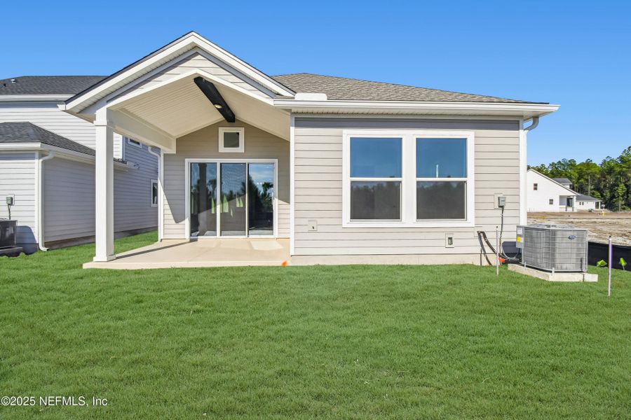 Exterior details and patio area of a home in Evergreen Island at Silverleaf - Executive, St. Augustine (Image 2). Exterior details and patio area of a home in Evergreen Island at Silverleaf - Executive, St. Augustine (Image 2).