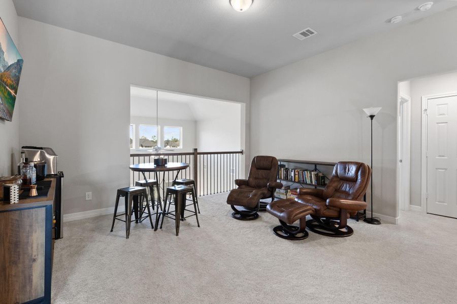 Enjoy views of the backyard from the balcony in the game room.