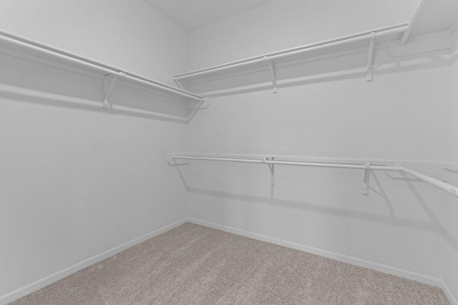 A view of your large primary walk-in Closet A view of your large primary walk-in Closet