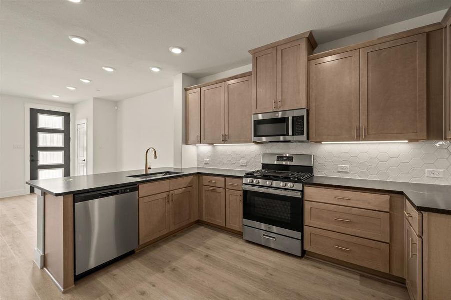 Beautiful finishes and thoughtful design make this kitchen stand out from the crowd! Beautiful finishes and thoughtful design make this kitchen stand out from the crowd!