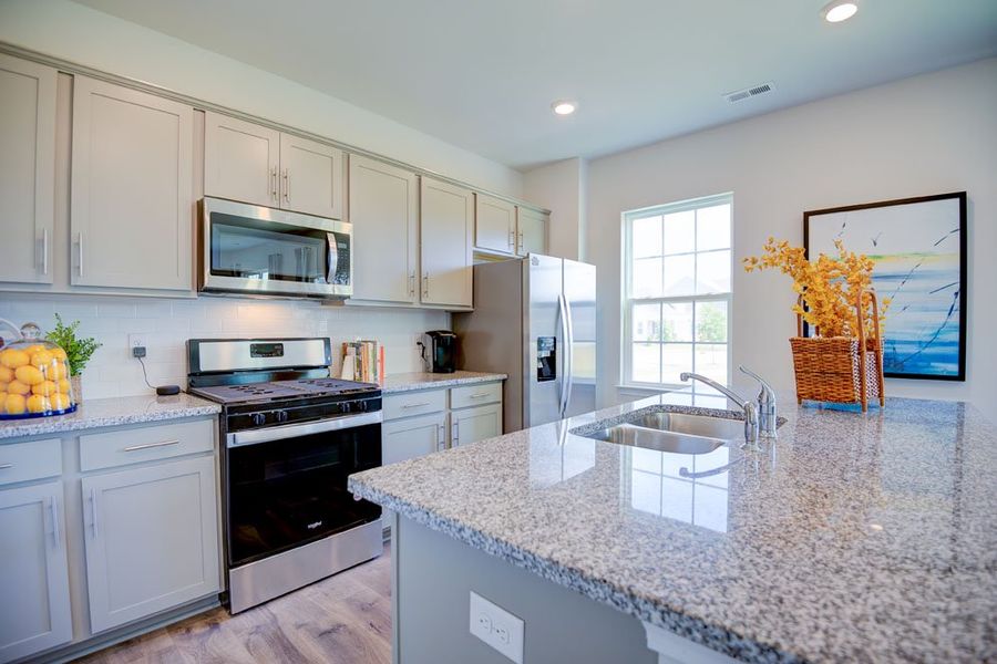 Representative furnished interior of a home built from the PENWELL by D.R. Horton in West New Bern, New Bern (Image 9).