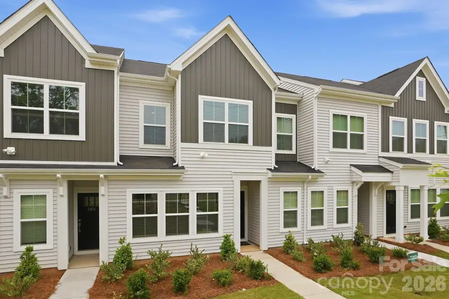 Front exterior of a new home in Sloan Station, Charlotte, NC, highlighting curb appeal (Image 2). Front exterior of a new home in Sloan Station, Charlotte, NC, highlighting curb appeal (Image 2).