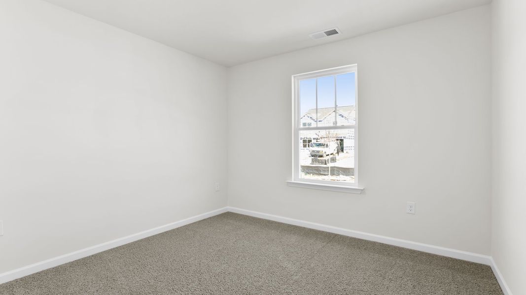 Spacious, unfurnished interior of a new home in Village Grove, Greenville (Image 16).