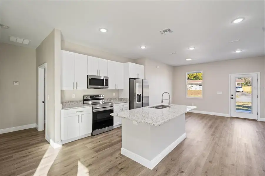 Furnished interior view inside a new home in , Deltona (Image 7).