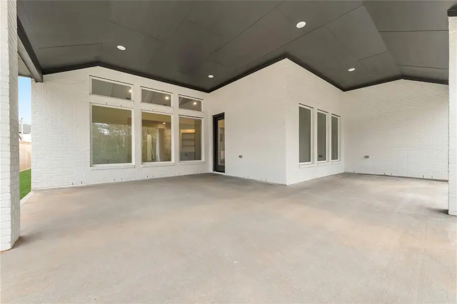 Exterior details and patio area of a home in Kresston - 65', Montgomery (Image 3).