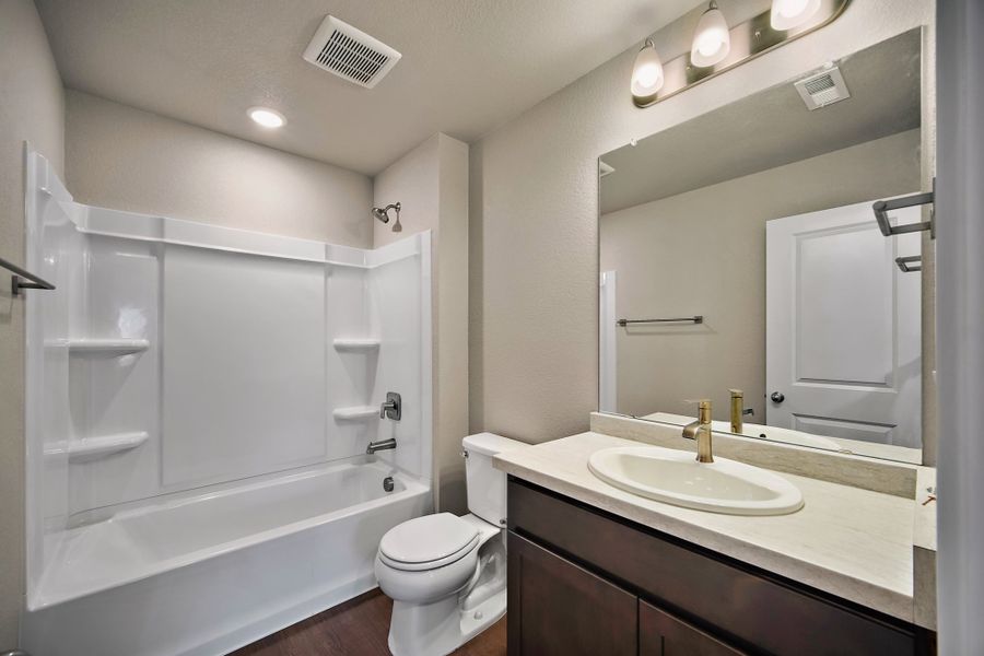 Furnished interior view inside a new home in Ridge at Lorson Ranch, Colorado Springs (Image 19).