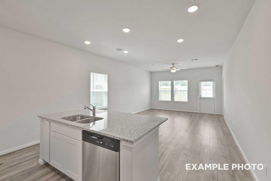 Furnished interior view inside a new home in Spring Branch Crossing, Conroe (Image 3).