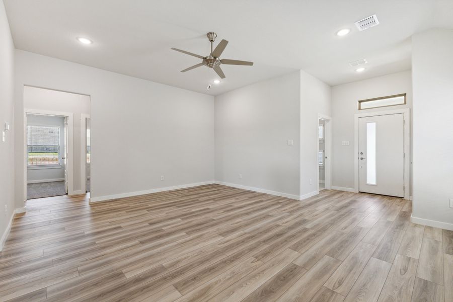 Living Room in the Amber home plan by Trophy Signature Homes – REPRESENTATIVE PHOTO