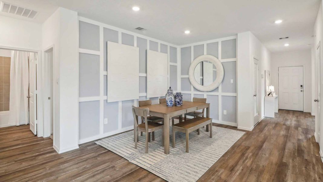 Furnished interior view inside a new home in Sunterra, Katy (Image 8).