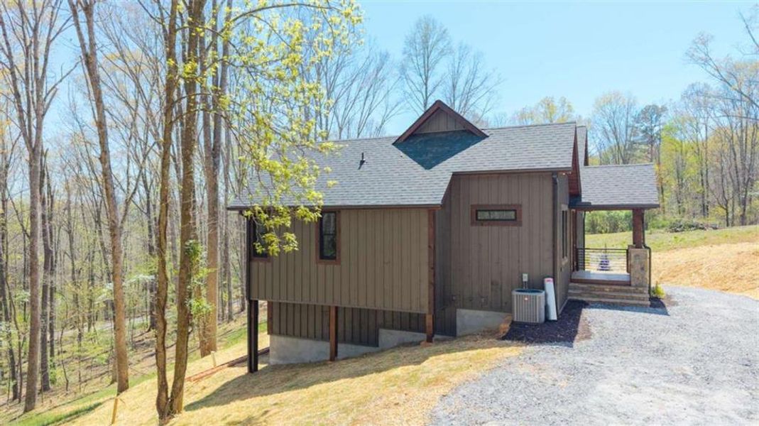 Front exterior of a new home in , Mineral Bluff, GA, highlighting curb appeal (Image 20).
