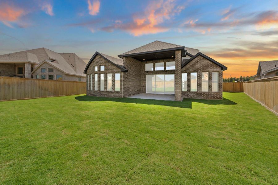Exterior details and patio area of a home in Bridgeland, Cypress (Image 3).