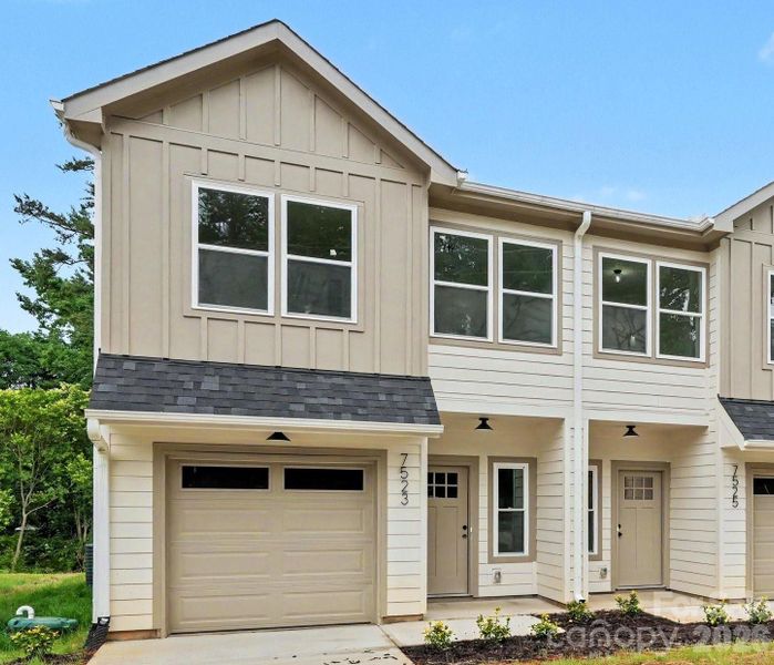 Front exterior of a new home in , Charlotte, NC, highlighting curb appeal (Image 20).