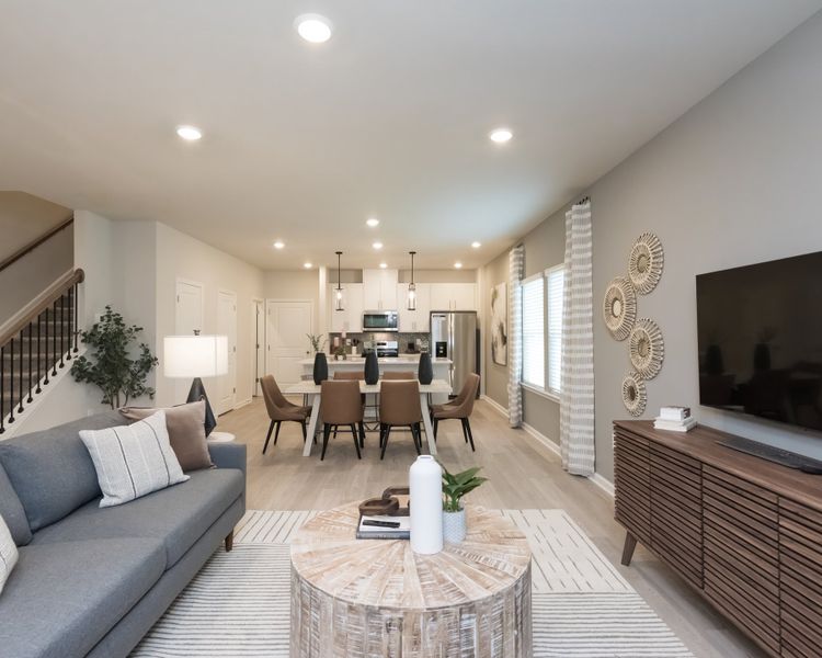 Cook dinner while chatting with family in this open-concept layout.