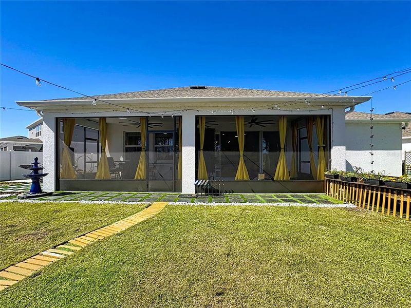 Exterior details and patio area of a home in Bridgewalk, St. Cloud (Image 30).