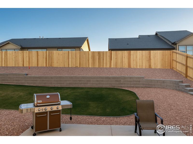 Exterior details and patio area of a home in Highlands Preserve, Mead (Image 4).