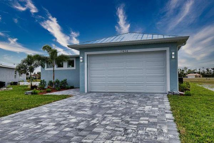 Front exterior of a new home in , Punta Gorda, FL, highlighting curb appeal (Image 27). Front exterior of a new home in , Punta Gorda, FL, highlighting curb appeal (Image 27).