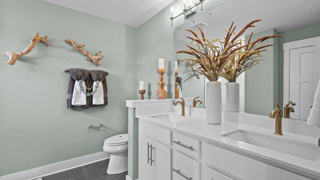 Primary Bathroom of The Cameron Design by DRB Homes