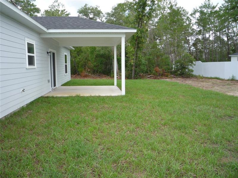 Exterior details and patio area of a home in , Ocala (Image 24).