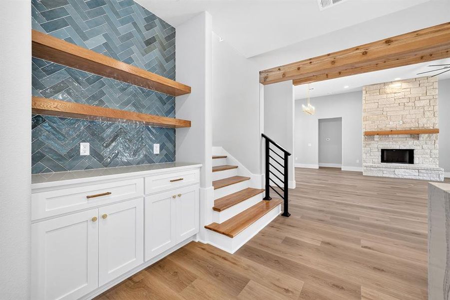 Coffee bar with herringbone tile, built in shelves, and cabinets. Coffee bar with herringbone tile, built in shelves, and cabinets.