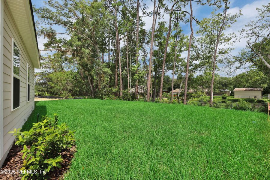 Exterior details and patio area of a home in Creighton Pointe, Fleming Island (Image 31). Exterior details and patio area of a home in Creighton Pointe, Fleming Island (Image 31).