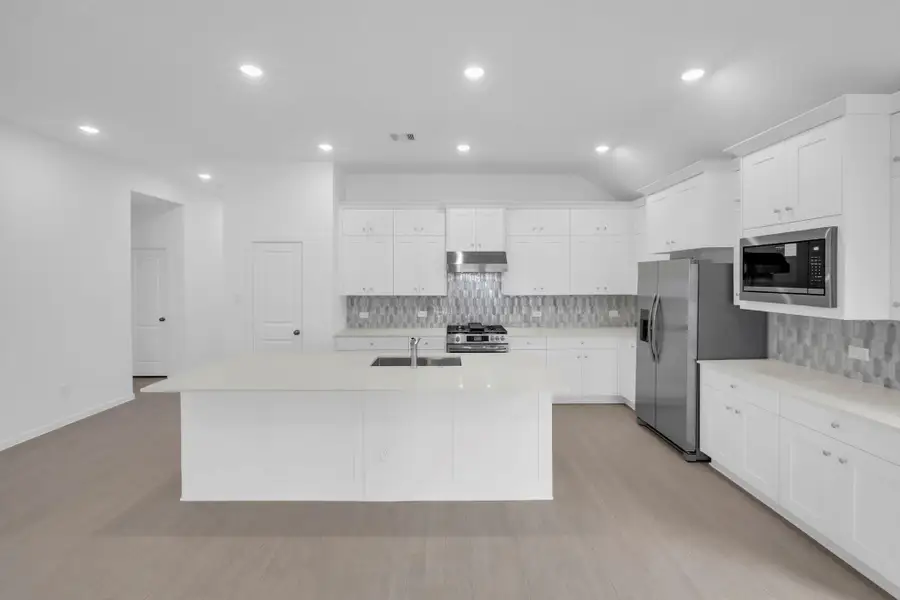 Furnished interior view inside a new home in Windrose Green: Bristol Collection, Angleton (Image 3).