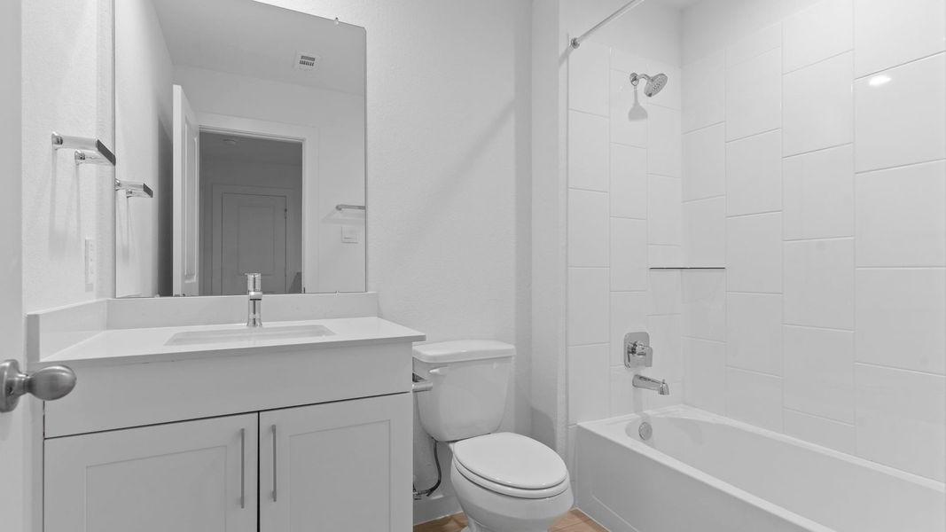 Furnished interior view inside a new home in Lexington Village, Missouri City (Image 16).