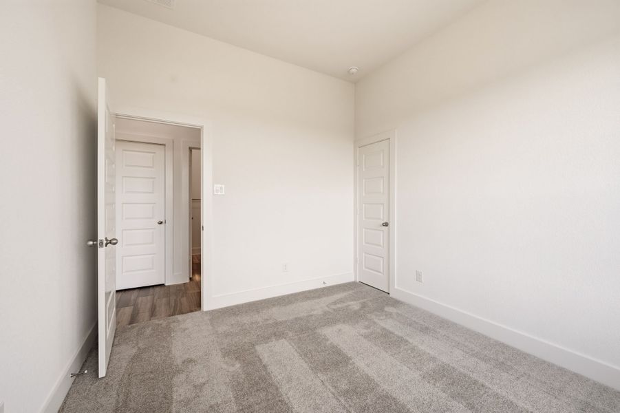 Spacious, unfurnished interior of a new home in Saddleback Estates, Boyd (Image 36).