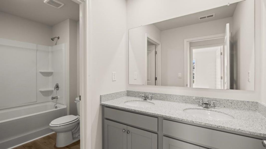 Furnished interior view inside a new home in Fairway 17 at Mirror Lake, Villa Rica (Image 8).