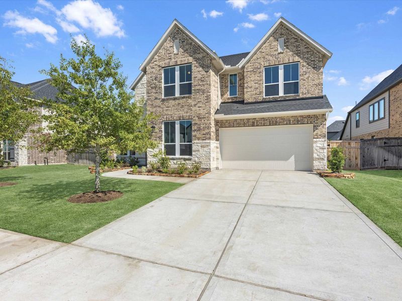 Front exterior of a new home in Cross Creek Ranch 60′, Fulshear, TX, highlighting curb appeal (Image 30).