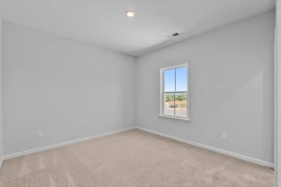 Spacious, unfurnished interior of a new home in Lilah Grove, Summerfield (Image 47).