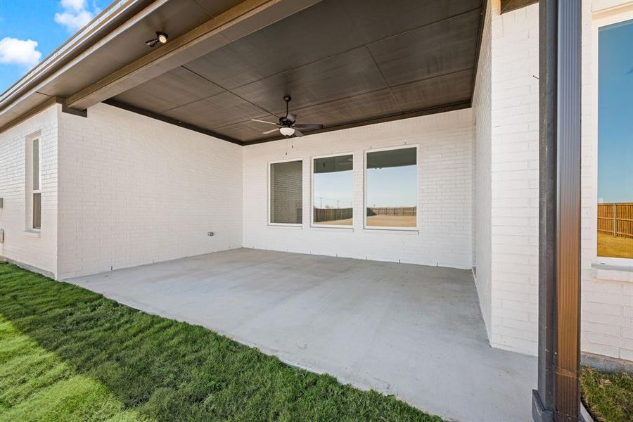 Exterior details and patio area of a home in Settlers Glen, New Fairview (Image 24).