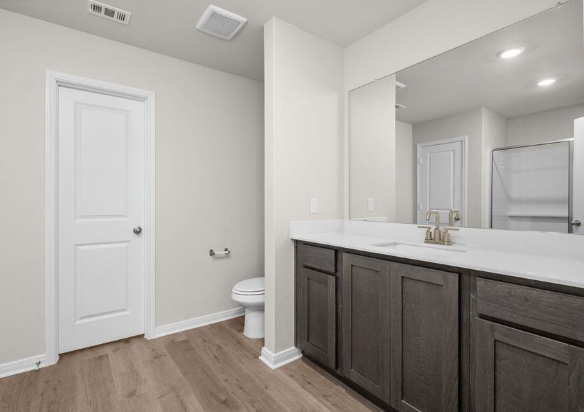 The master bathroom has a large vanity space. The master bathroom has a large vanity space.