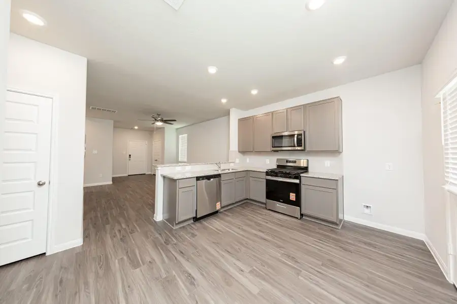 Furnished interior view inside a new home in River's Edge, Conroe (Image 6).