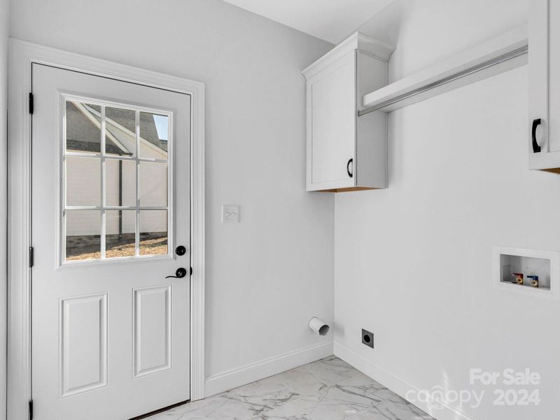 Laundry room with entry door!