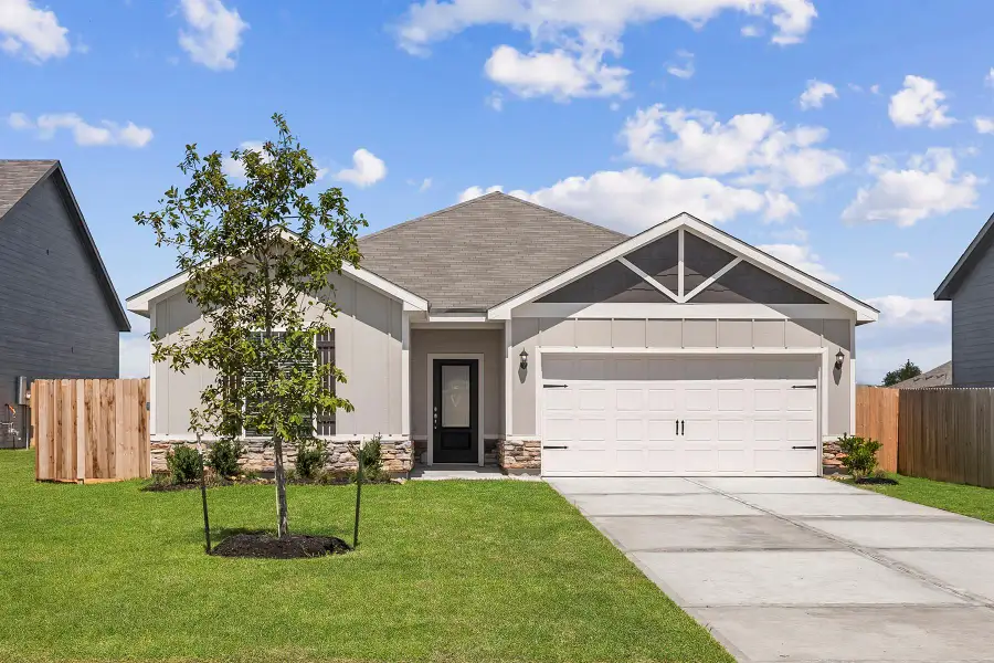 Front exterior of a home in the Trails at Cochran Ranch community, located in Waller, TX (Image 2).