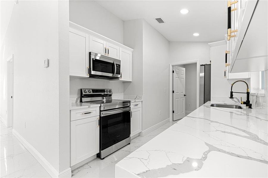 Furnished interior view inside a new home in , Summerfield (Image 6). Furnished interior view inside a new home in , Summerfield (Image 6).