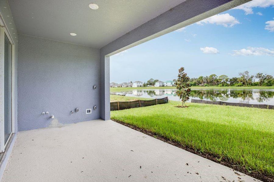 Exterior details and patio area of a home in Indigo Creek, Apollo Beach (Image 4).