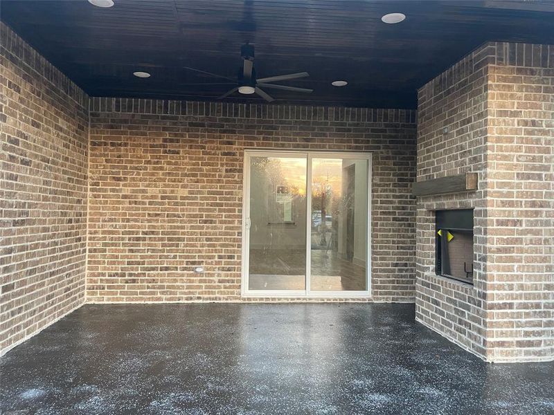 View of patio featuring ceiling fan