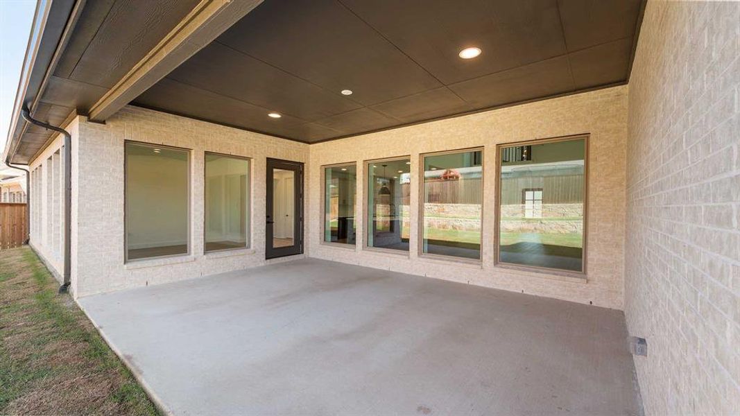 Exterior details and patio area of a home in Somerset Park 80', Rockwall (Image 3).