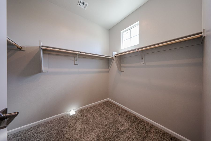 A room with a metal bar.