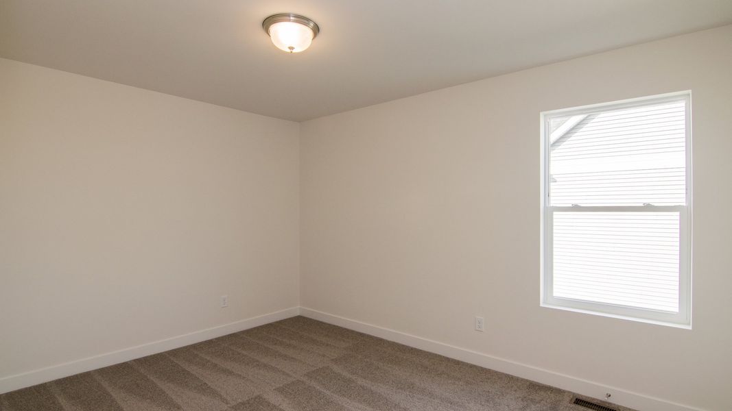 Representative unfurnished interior of a home built from the The Hartland by Norfolk Homes in Coronado Estates, Jackson (Image 71).