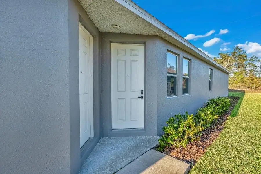 Exterior details and patio area of a home in Archers Mill, Ormond Beach (Image 3). Exterior details and patio area of a home in Archers Mill, Ormond Beach (Image 3).